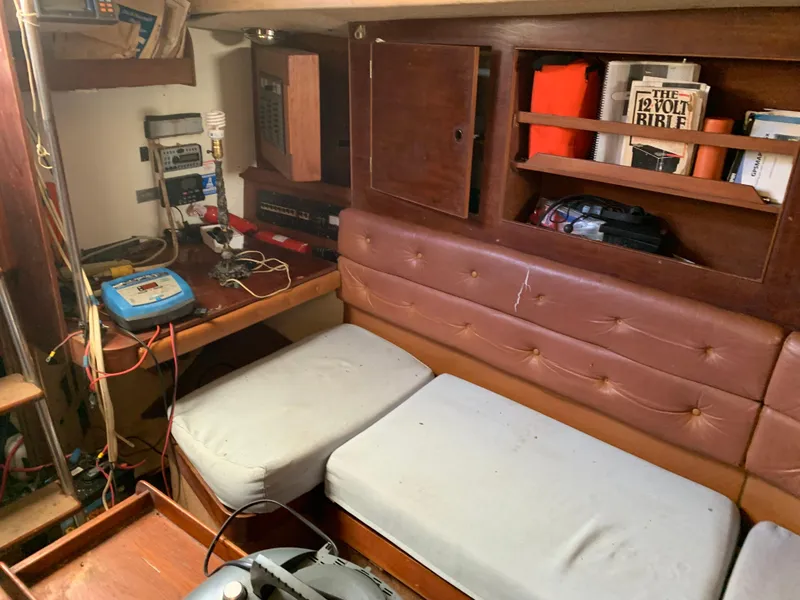 Slide: The Image of 1978 Camper & Nicholsons Sloop interior with navigation equipment and leather seating. - 12