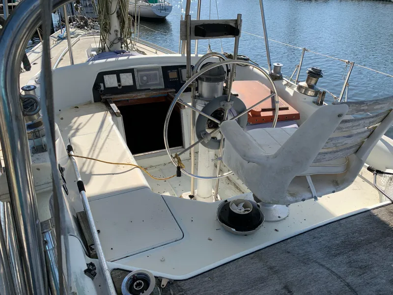 Slide: The Image of 1978 Camper & Nicholsons Sloop cockpit with steering wheel and navigation instruments. - 4