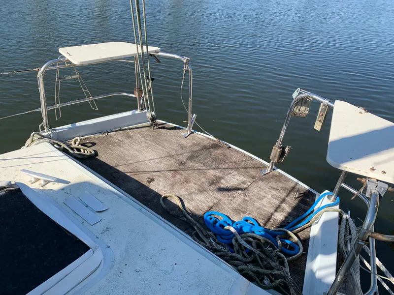 Slide: The Image of 1978 Camper & Nicholsons Sloop deck with ropes and water view. - 5