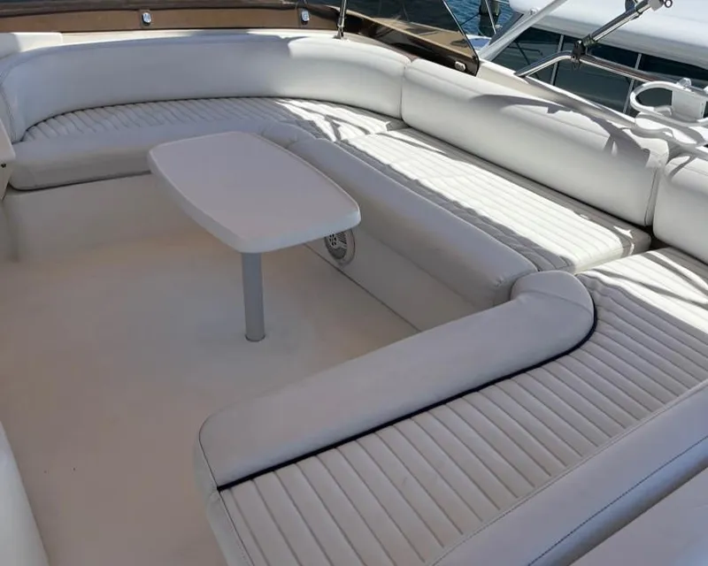 Slide: The Image of Luxurious seating area on 1998 Viking Princess 46 Flybridge Sport Cruiser yacht. - 13