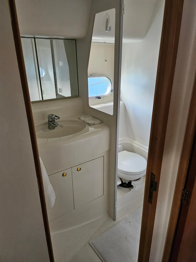 Slide: The Image of Bathroom interior of 1998 Viking Princess 46 Flybridge Sport Cruiser yacht. - 20
