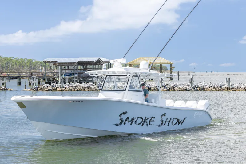 The Image of 2020 Yellowfin 39 Offshore boat named "Smoke Show" cruising near docks. - 0