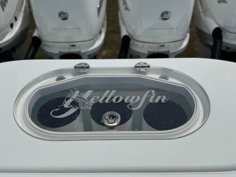 Slide: The Image of 2020 Yellowfin 39 Offshore boat with logo and multiple outboard engines. - 10