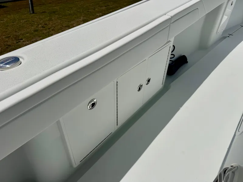 Slide: The Image of 2020 Yellowfin 39 Offshore boat interior with storage compartments. - 16