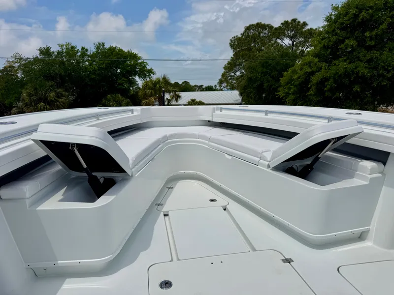 Slide: The Image of 2020 Yellowfin 39 Offshore boat with open storage compartments on deck. - 26