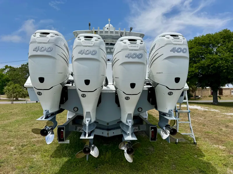 Slide: The Image of 2020 Yellowfin 39 Offshore boat with four powerful outboard engines on display. - 4