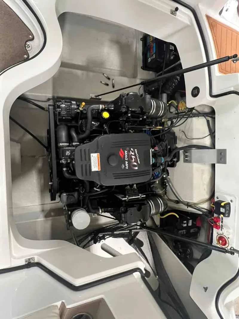 Slide: The Image of Engine compartment of a 2008 Cobalt 232 boat, featuring a MerCruiser 350 MAG engine. - 9