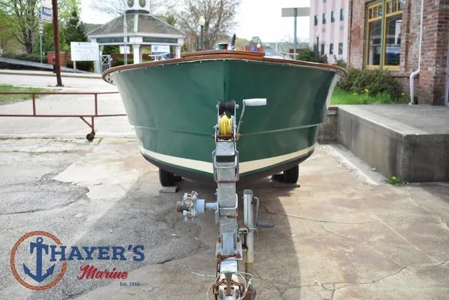 Slide: The Image of Green 1980 Carolina Skiff boat on trailer at Thayer's Marine. - 7