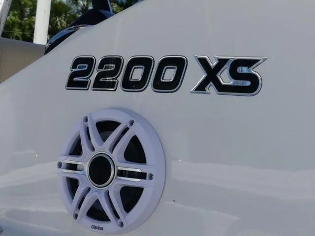 Slide: The Image of Bulls Bay 2200XS 2025 model with speaker detail on boat exterior. - 4