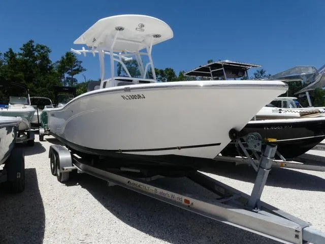 Slide: The Image of 2017 Sea Fox 246 Commander boat with family fishing at sunset. - 1