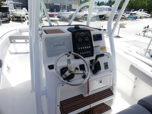 Slide: The Image of 2017 Sea Fox 246 Commander boat console with Garmin navigation system and steering wheel. - 10