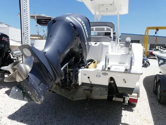 Slide: The Image of 2017 Sea Fox 246 Commander boat with Yamaha outboard motor, parked on gravel. - 5