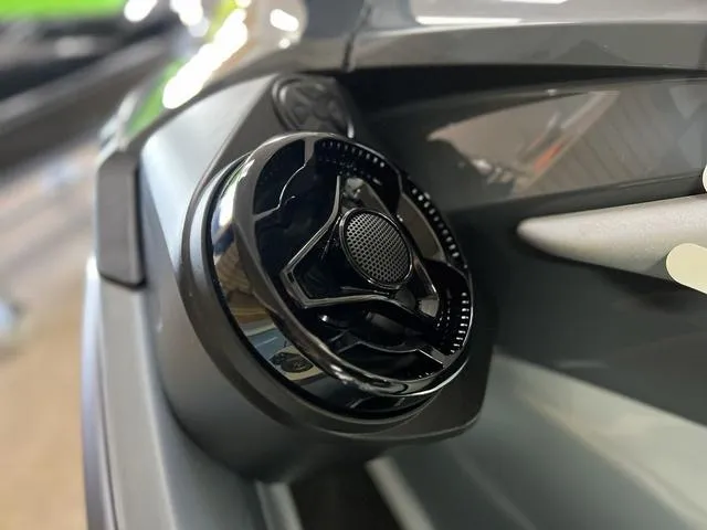 Slide: The Image of 2024 Sea-Doo Waverunner RXT speaker detail, showcasing sleek black design. - 4