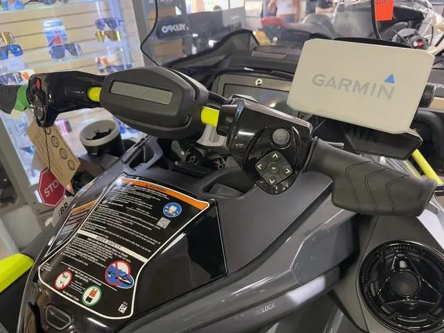 Slide: The Image of 2025 Sea-Doo Waverunner Explorer Pro 170 dashboard with Garmin GPS and controls. - 5