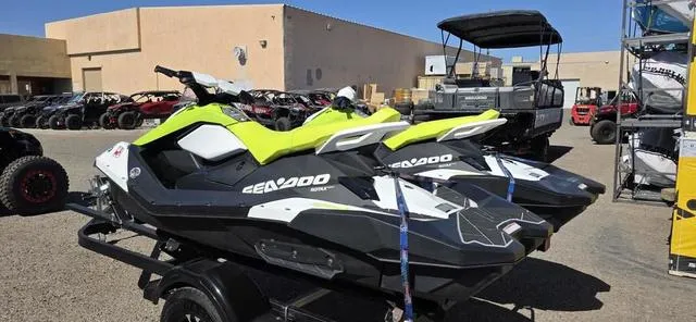 Slide: The Image of 2023 Sea-Doo Waverunner Spark 3-Up Rotax 900 ACE on trailer in outdoor lot. - 6