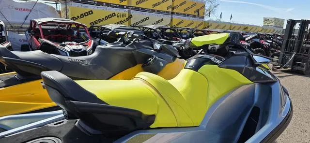 Slide: The Image of 2022 Sea-Doo Waverunner GTI SE 130 iBR in a showroom display. - 10