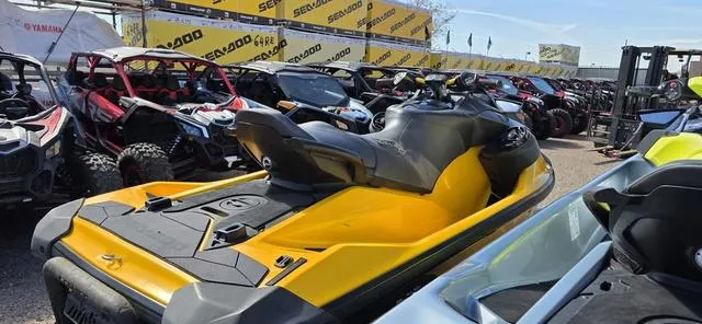 Slide: The Image of 2021 Sea-Doo RXP-X 300 in Millennium Yellow, displayed among other vehicles. - 5