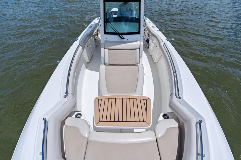 Slide: The Image of 2020 Boston Whaler 280 Outrage boat with spacious seating on open water. - 16