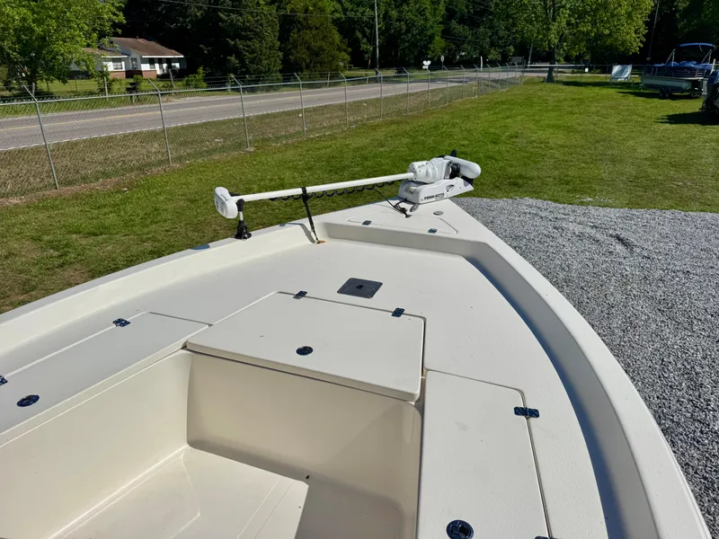 Slide: The Image of 2018 Bulls Bay 2200 boat with trolling motor on grassy area. - 6