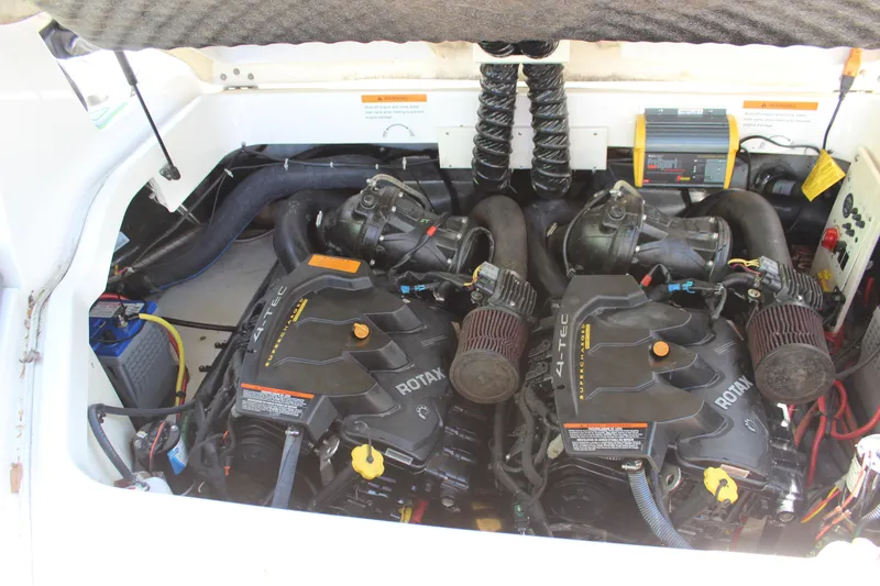 Slide: The Image of 2017 Chaparral Vortex 2430 VRX engine compartment with dual Rotax engines. - 14