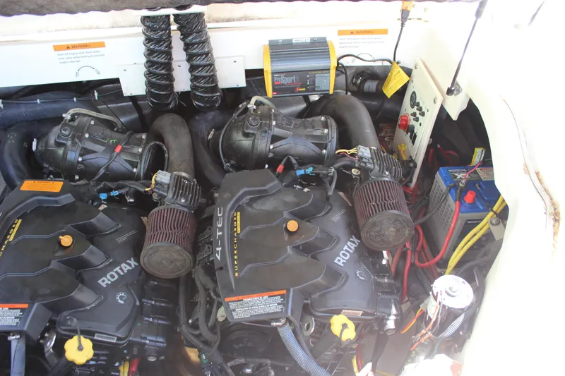 Slide: The Image of Engine compartment of a 2017 Chaparral Vortex 2430 VRX with Rotax engines. - 16