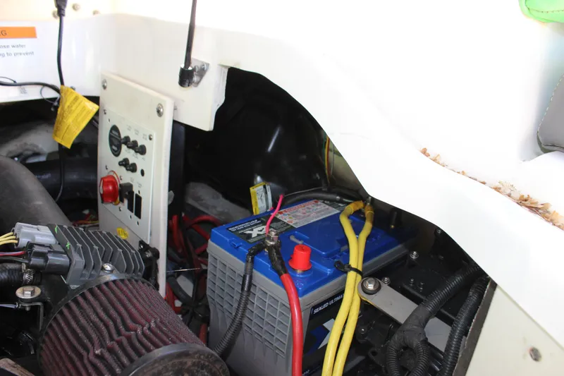 Slide: The Image of Engine compartment of 2017 Chaparral Vortex 2430 VRX with battery and wiring. - 19