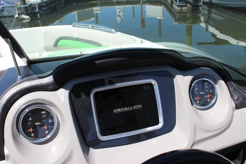 Slide: The Image of Dashboard of 2017 Chaparral Vortex 2430 VRX boat with Medallion display and gauges. - 21