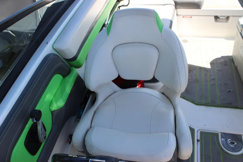 Slide: The Image of 2017 Chaparral Vortex 2430 VRX boat interior with white and green seating. - 31