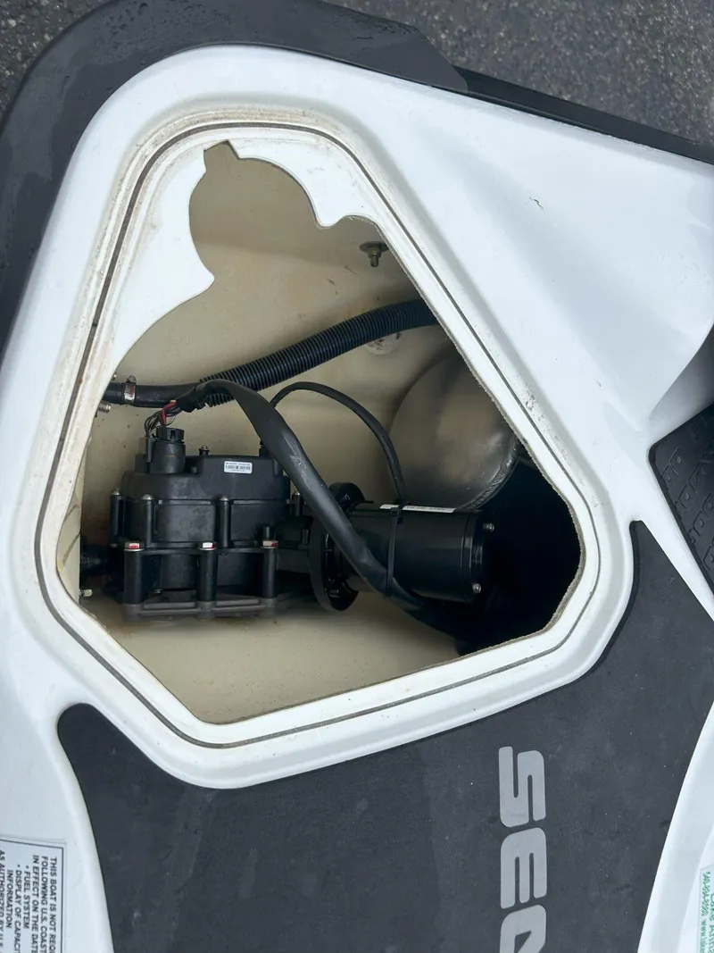 Slide: The Image of Open storage compartment of a 2015 Sea-Doo GTX 155 watercraft. - 11