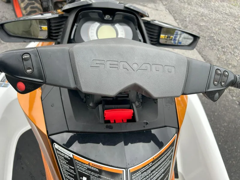 Slide: The Image of 2015 Sea-Doo GTX 155 dashboard with controls and steering handle. - 13