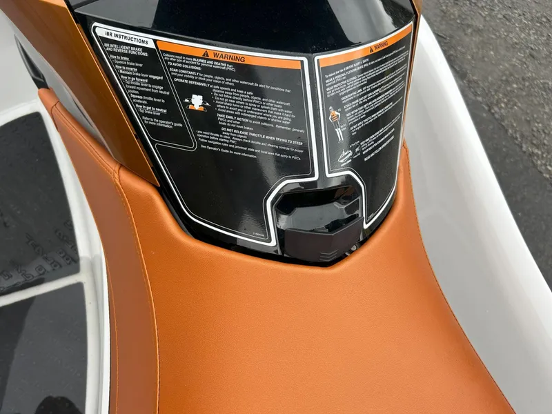 Slide: The Image of 2015 Sea-Doo GTX 155 seat and control panel with safety instructions. - 14