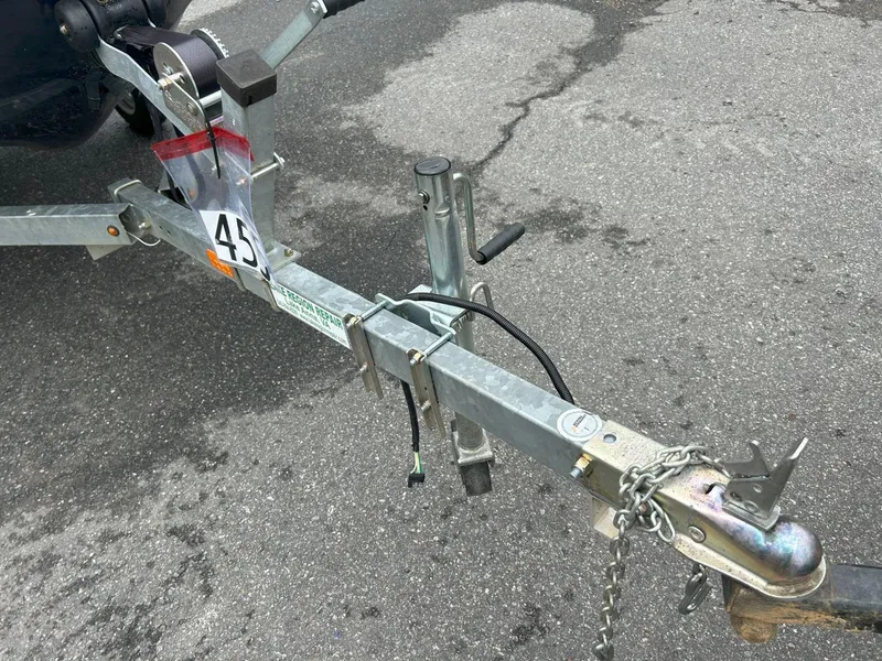 Slide: The Image of Trailer hitch for 2015 Sea-Doo GTX 155 on asphalt surface. - 7