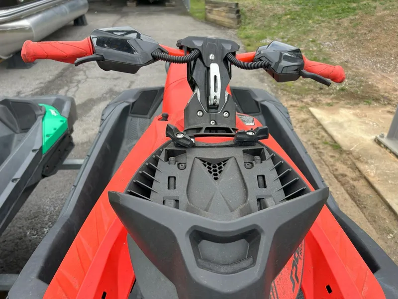 Slide: The Image of 2021 Sea-Doo Spark Trixx 3up iBR with sound system, red handlebars, and sleek design. - 5