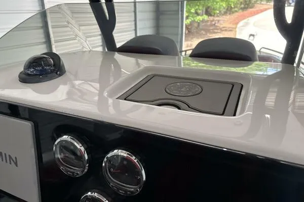 Slide: The Image of 2025 Concept 27' Open Deck boat dashboard with gauges and compass. - 15