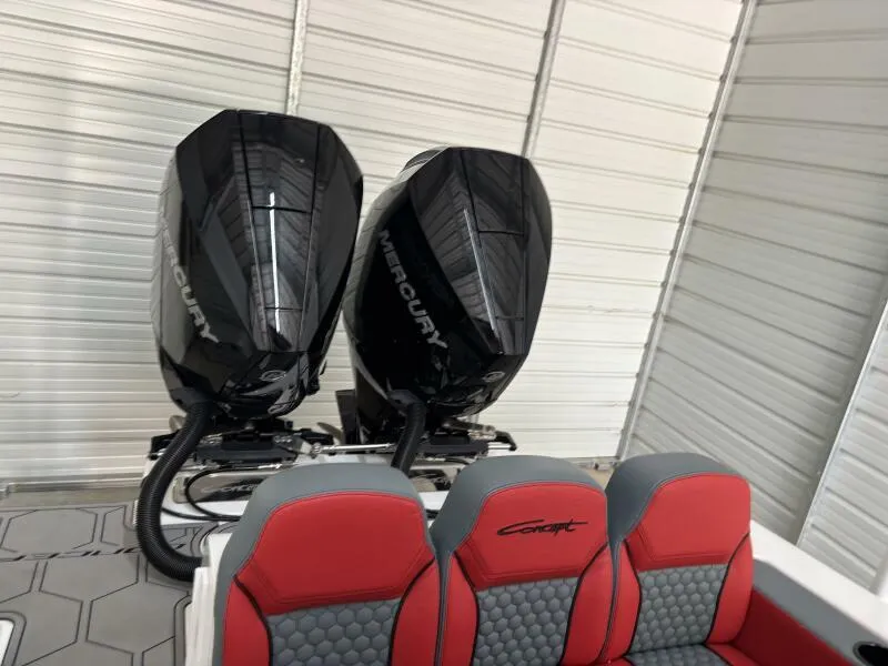 Slide: The Image of 2025 Concept 27' Open Deck boat with dual Mercury outboard engines and red-gray seating. - 18