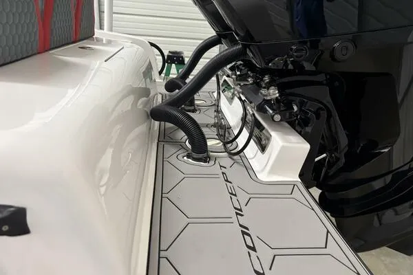 Slide: The Image of 2025 Concept 27' Open Deck boat with sleek design and modern engine components. - 21