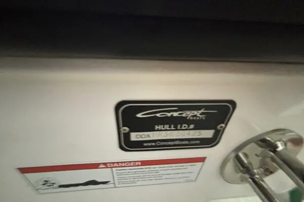 Slide: The Image of 2025 Concept 27' Open Deck boat hull ID plate with warning label. - 33