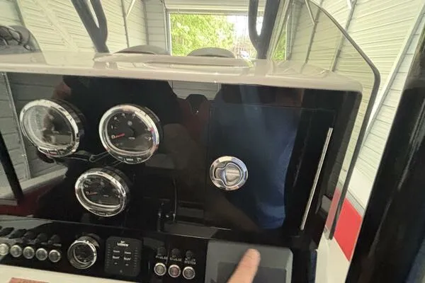 Slide: The Image of Dashboard of 2025 Concept 27' Open Deck boat with gauges and controls. - 35