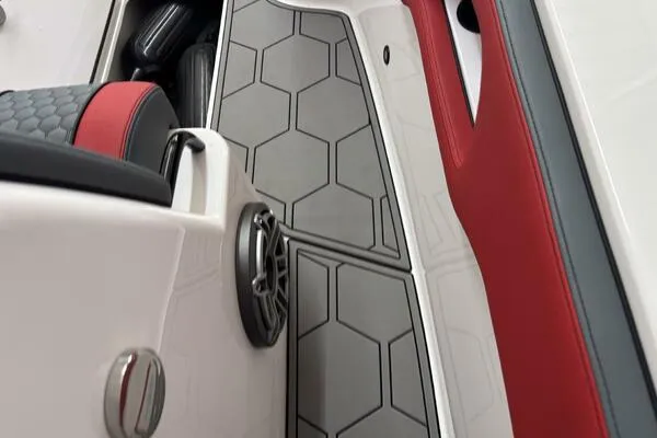 Slide: The Image of 2025 Concept 27' Open Deck interior with hexagonal flooring and red-black seating. - 49