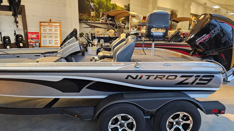 Slide: The Image of 2024 Nitro Z19 Pro boat in showroom, featuring sleek design and modern equipment. - 0