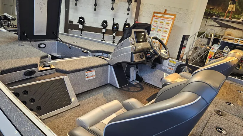Slide: The Image of 2024 Nitro Z19 Pro boat interior with modern dashboard and seating. - 4