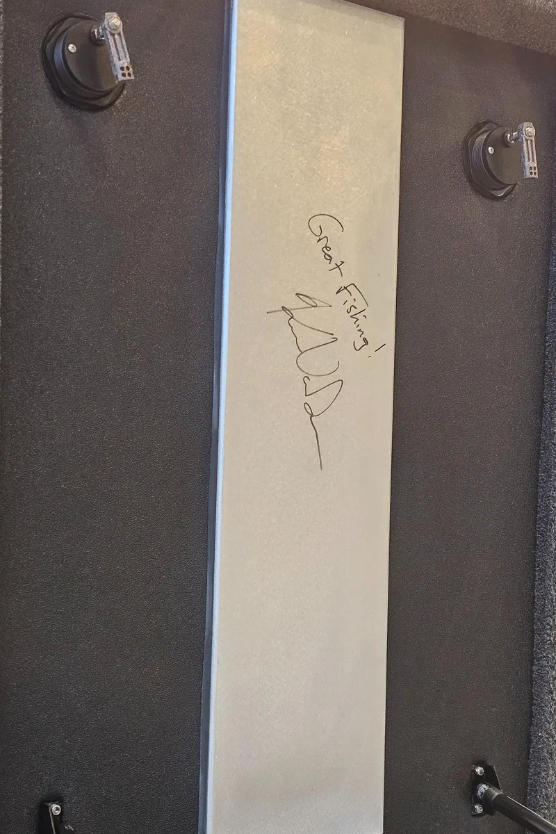 Slide: The Image of 2024 Nitro Z19 Pro boat interior with signed panel and suction cup mounts. - 5