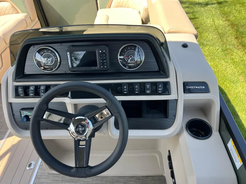 Slide: The Image of Steering console of 2025 Godfrey Sweetwater 2286 Quad Social Tri-Toon boat. - 23