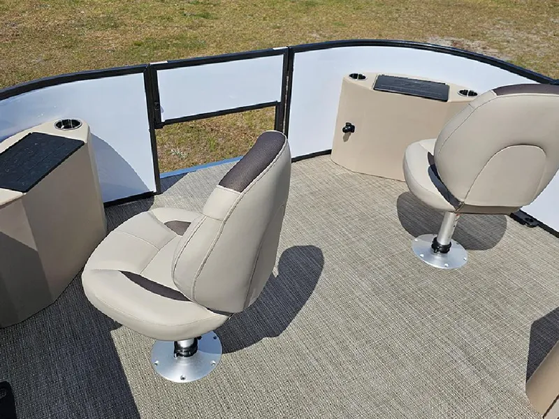 Slide: The Image of 2025 Bentley Pontoons 240 4-Point Fish interior with swivel seats and carpeted flooring. - 20