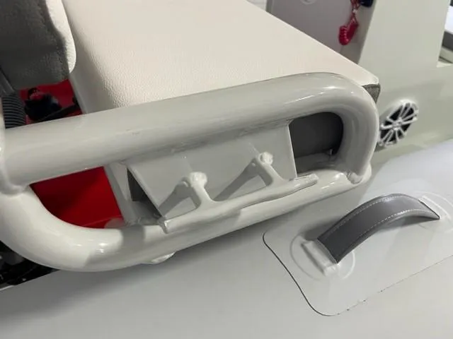 Slide: The Image of 2024 ZAR Mini RIB 15 Tender boat detail, featuring a sturdy handle and seating area. - 7