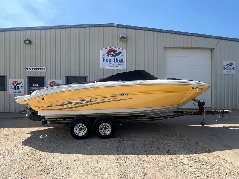 Slide: The Image of 2005 Sea Ray 220 Select boat in front of Boji Boat building. - 28