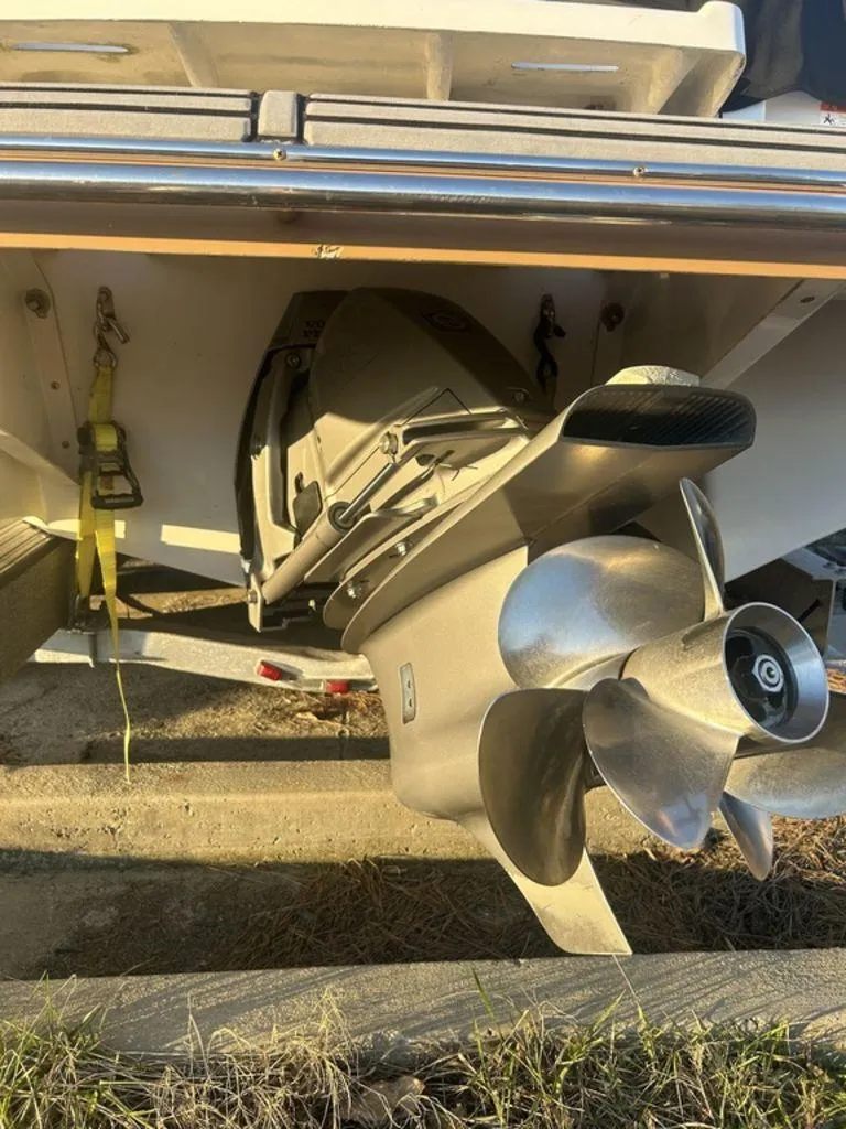 Slide: The Image of 2017 Four Winns H260 boat propeller and stern drive in sunlight. - 6