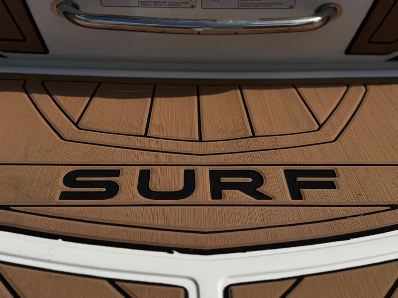 Slide: The Image of 2017 Nautique Super Air Nautique GS20 surf platform with teak finish. - 23