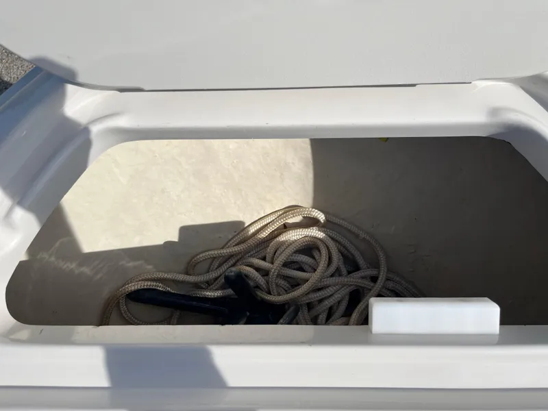 Slide: The Image of Storage compartment with rope in a 2008 Sea Ray 205 Sport boat. - 4