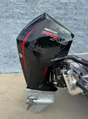 Slide: The Image of Outboard motor on a 2025 Phoenix 919ZXL boat, featuring Mercury Pro XS branding. - 6